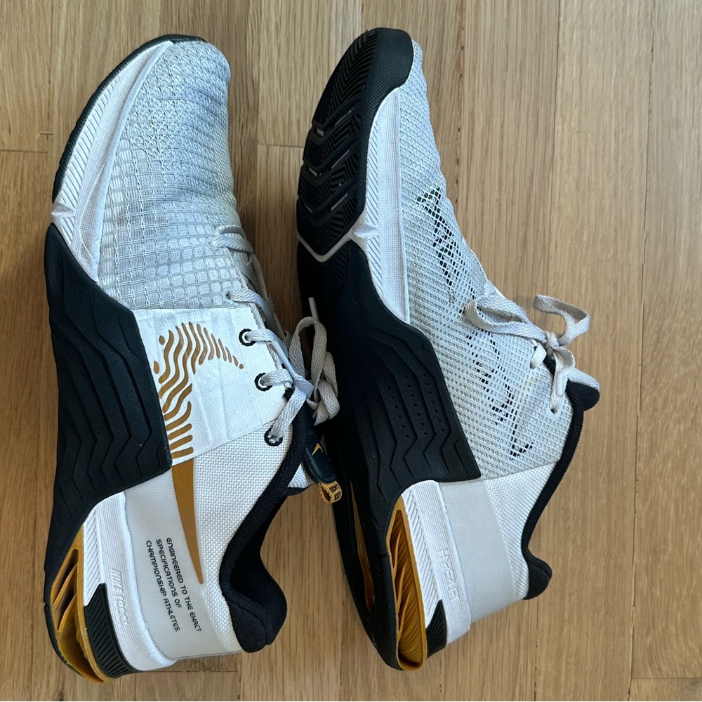 Nike White Black Gold Athletic Shoes